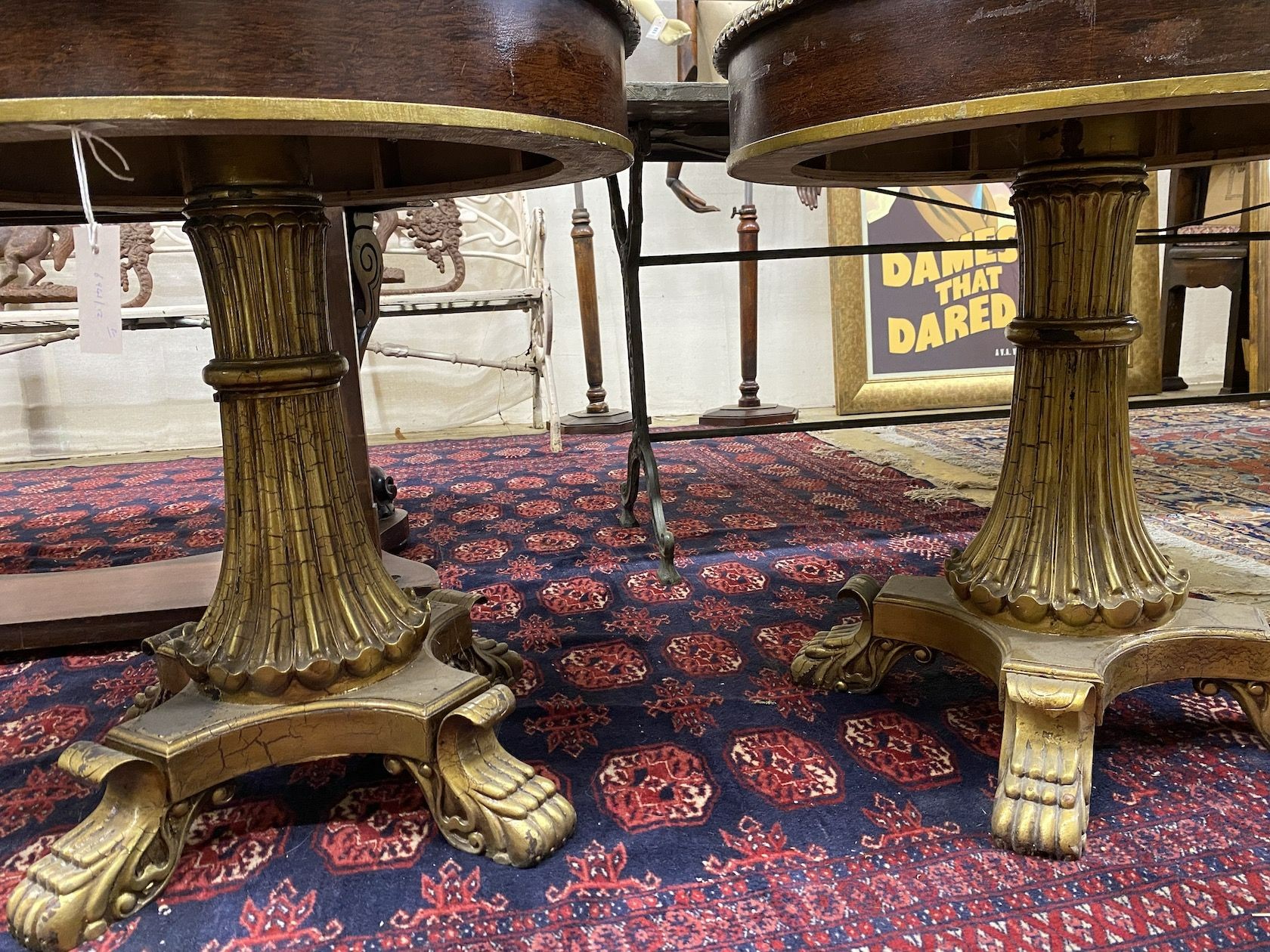 A pair of Empire style circular wood and composition faux parquetry occasional tables, diameter 69cm, height 69cm
